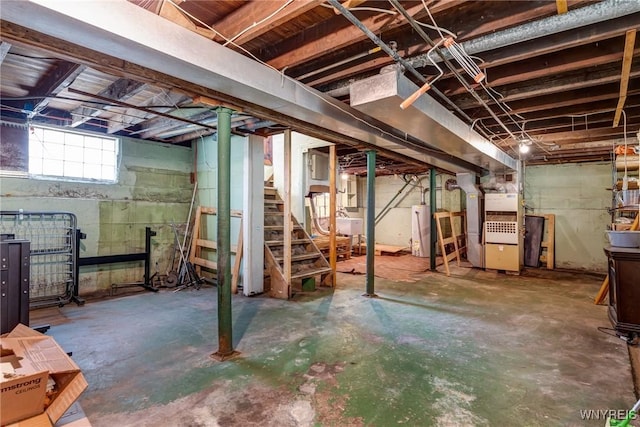 2239 Willow Ave, Niagara Falls, NY 14305 - below grade area featuring stairway, gas water heater, and heating unit