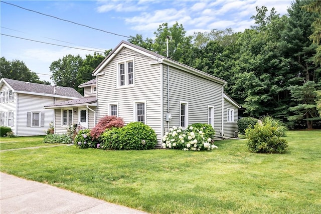 11 Walnut St, Phelps, NY 14533 - view of front of house with a front lawn