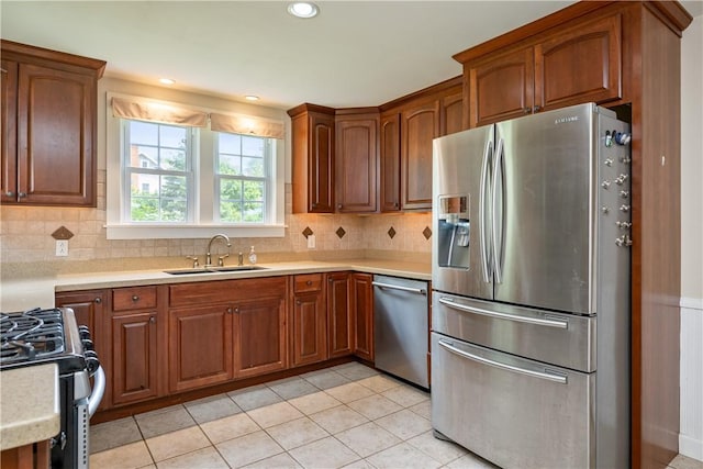 11 Walnut St, Phelps, NY 14533 - kitchen featuring stainless steel appliances, light countertops, decorative backsplash, light tile patterned flooring, and recessed lighting