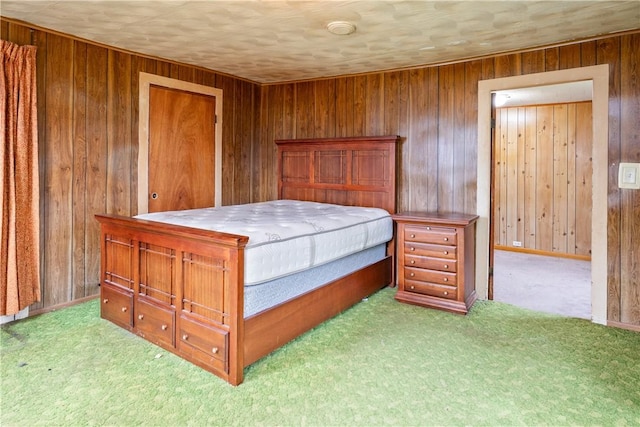 11 Walnut St, Phelps, NY 14533 - carpeted bedroom featuring wood walls