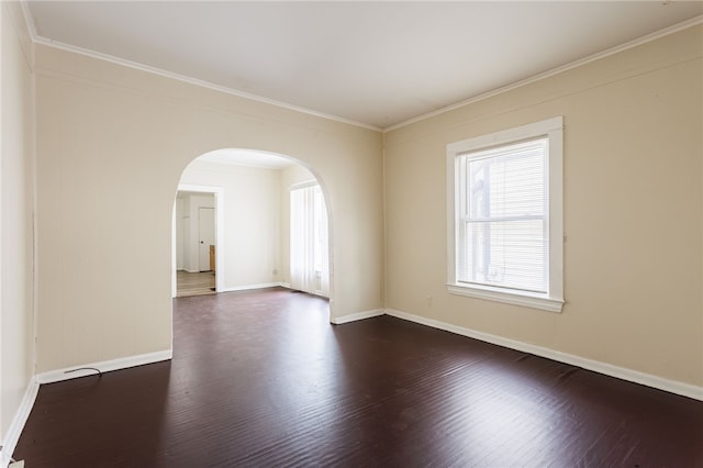 900-902 S Plymouth Ave, Rochester, NY 14608 - unfurnished room featuring dark wood-style flooring, arched walkways, and crown molding