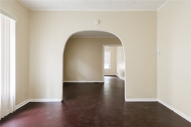 900-902 S Plymouth Ave, Rochester, NY 14608 - unfurnished room featuring arched walkways, wood finished floors, ornamental molding, and a smoke detector