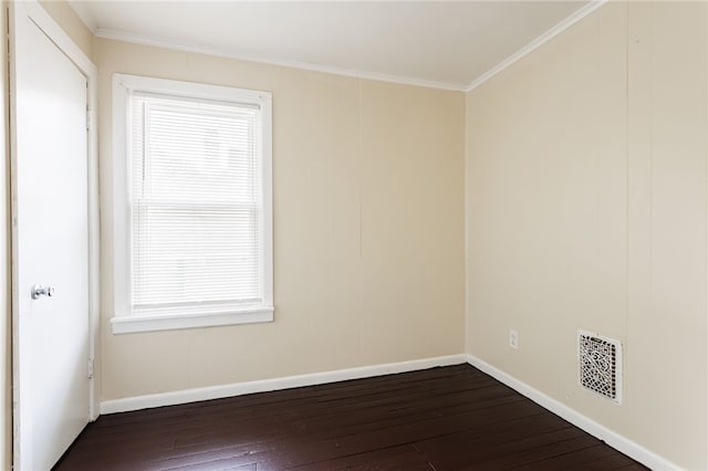 900-902 S Plymouth Ave, Rochester, NY 14608 - spare room featuring dark wood-type flooring, crown molding, and healthy amount of natural light