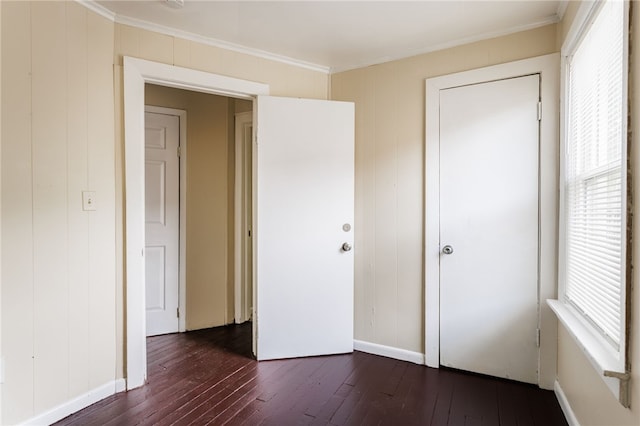 900-902 S Plymouth Ave, Rochester, NY 14608 - unfurnished bedroom featuring ornamental molding and dark wood finished floors