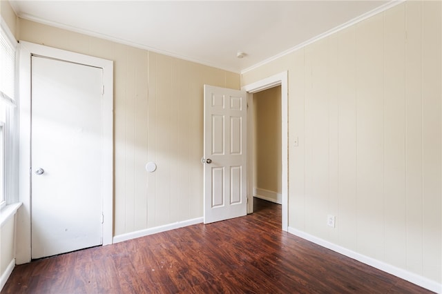 900-902 S Plymouth Ave, Rochester, NY 14608 - unfurnished bedroom featuring dark wood-style flooring and crown molding