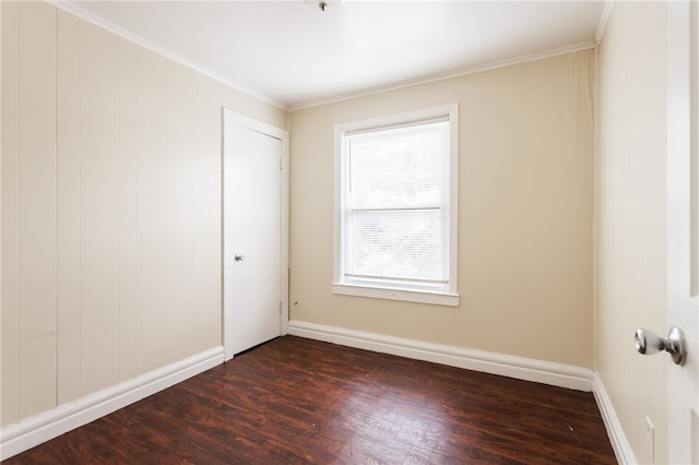 900-902 S Plymouth Ave, Rochester, NY 14608 - spare room featuring dark wood-style floors and ornamental molding