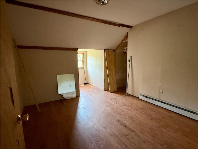 1796 Gladstone Hollow Rd, Andes, NY 13731 - unfurnished room with wood finished floors, vaulted ceiling, and a baseboard radiator