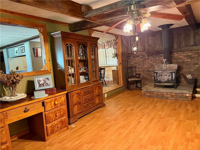 1796 Gladstone Hollow Rd, Andes, NY 13731 - office featuring ceiling fan, light wood-style flooring, brick wall, beamed ceiling, and a wood stove
