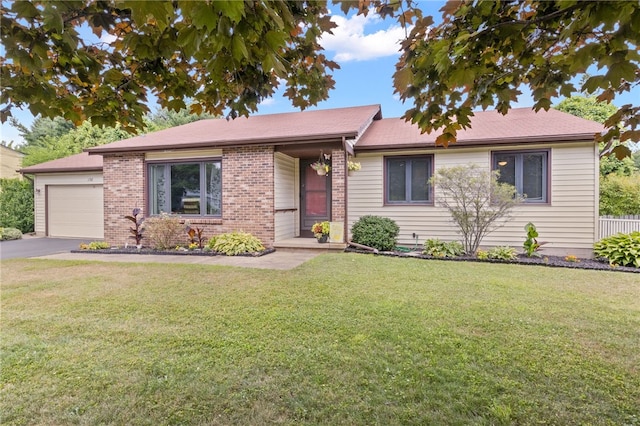 158 Round Pond Ln, Greece, NY 14626 - single story home with a front lawn, driveway, a garage, and brick siding