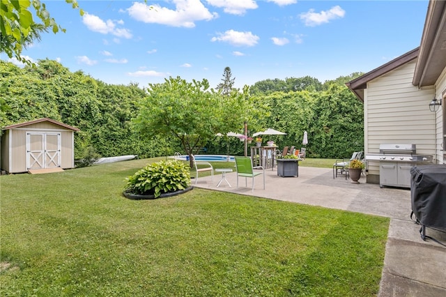 158 Round Pond Ln, Greece, NY 14626 - view of grassy yard with a shed, a patio, and an outdoor pool