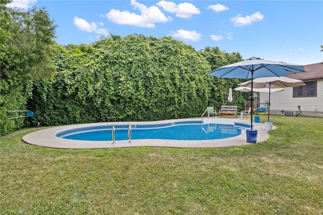 158 Round Pond Ln, Greece, NY 14626 - outdoor pool featuring a yard