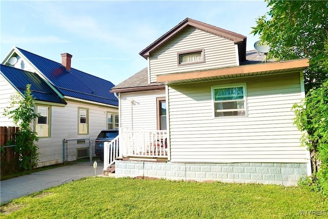 104 Argus St, Buffalo, NY 14207 - back of property with a shingled roof
