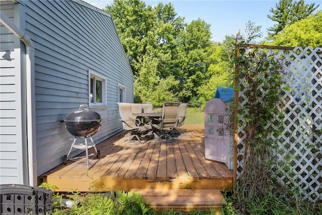 120 Furlong Rd, Brighton, NY 14623 - deck with outdoor dining space and a grill