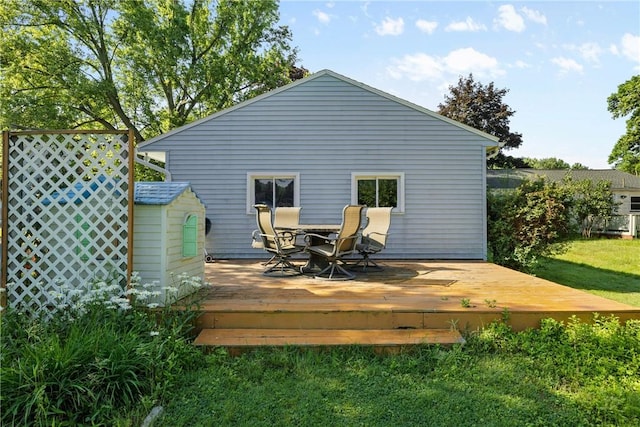 120 Furlong Rd, Brighton, NY 14623 - rear view of house featuring a lawn and a wooden deck