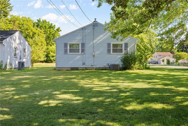 120 Furlong Rd, Brighton, NY 14623 - rear view of property featuring a lawn
