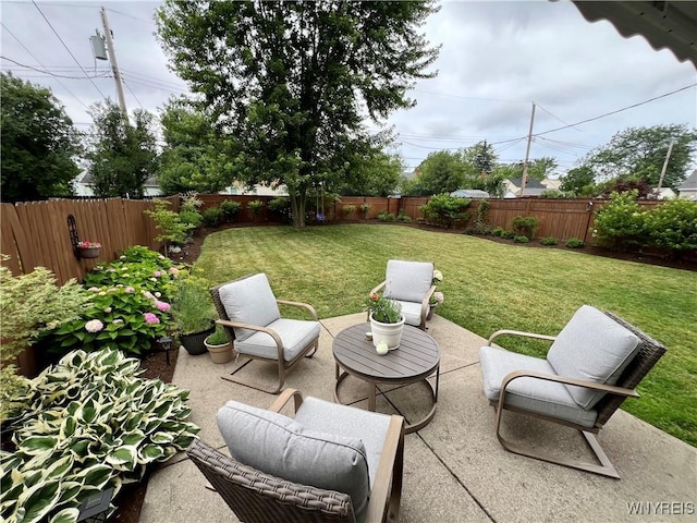 858 Starin Ave, Tonawanda, NY 14223 - fenced backyard featuring a patio area