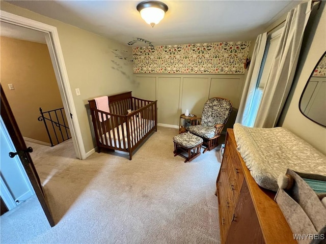 858 Starin Ave, Tonawanda, NY 14223 - bedroom with carpet flooring, a decorative wall, and wainscoting