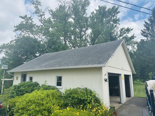 159 County Road 26, Afton, NY 13813 - view of side of property with a shingled roof and an outdoor structure