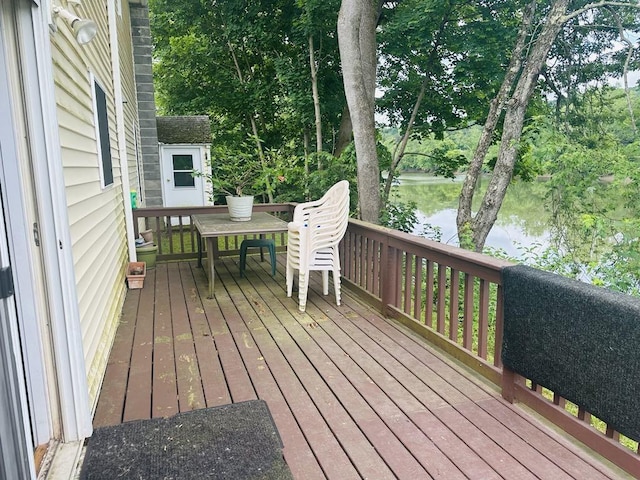 159 County Road 26, Afton, NY 13813 - wooden terrace featuring a water view, view of wooded area, and outdoor dining area