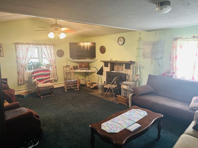 159 County Road 26, Afton, NY 13813 - living room with carpet floors, lofted ceiling, ceiling fan, baseboard heating, and a stone fireplace