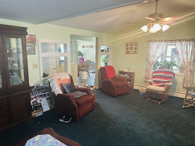 159 County Road 26, Afton, NY 13813 - carpeted living room with a ceiling fan and baseboard heating