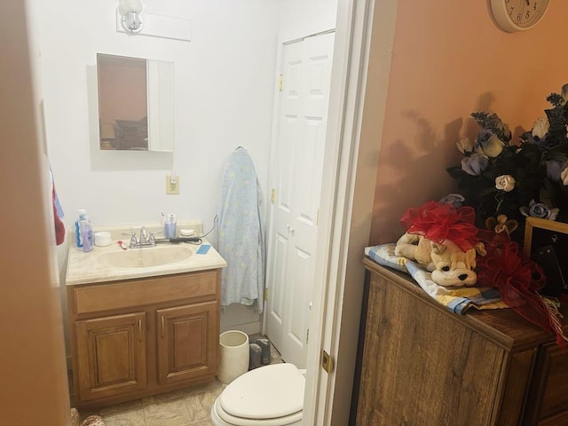 159 County Road 26, Afton, NY 13813 - bathroom featuring vanity and toilet
