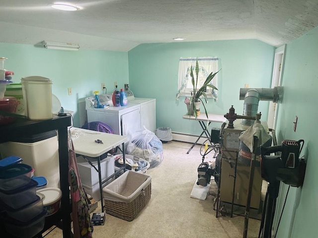 159 County Road 26, Afton, NY 13813 - carpeted bedroom featuring independent washer and dryer, lofted ceiling, and a baseboard radiator