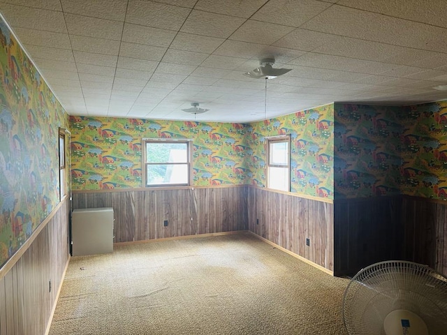 159 County Road 26, Afton, NY 13813 - empty room featuring wallpapered walls, a wainscoted wall, healthy amount of natural light, and carpet