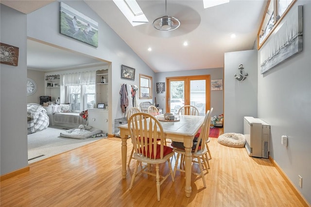 917 W Gray St, Elmira, NY 14905 - dining area featuring a ceiling fan, wood finished floors, a skylight, recessed lighting, and high vaulted ceiling