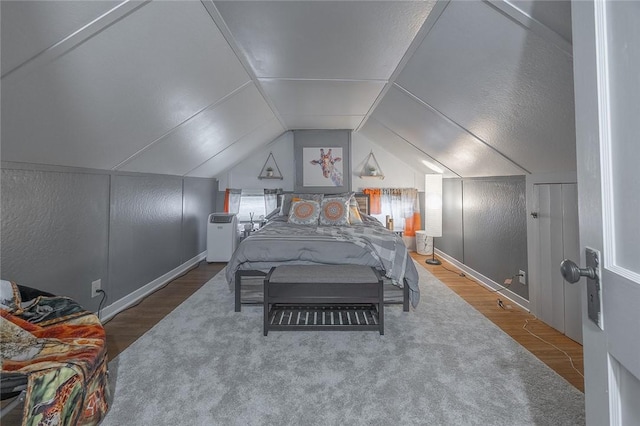 917 W Gray St, Elmira, NY 14905 - bedroom with wood finished floors and lofted ceiling