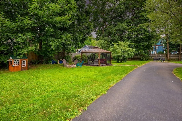 917 W Gray St, Elmira, NY 14905 - view of yard featuring a gazebo, a shed, and a fire pit