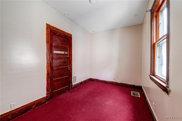 75 Schutrum St, Buffalo, NY 14212 - empty room with dark carpet and baseboards