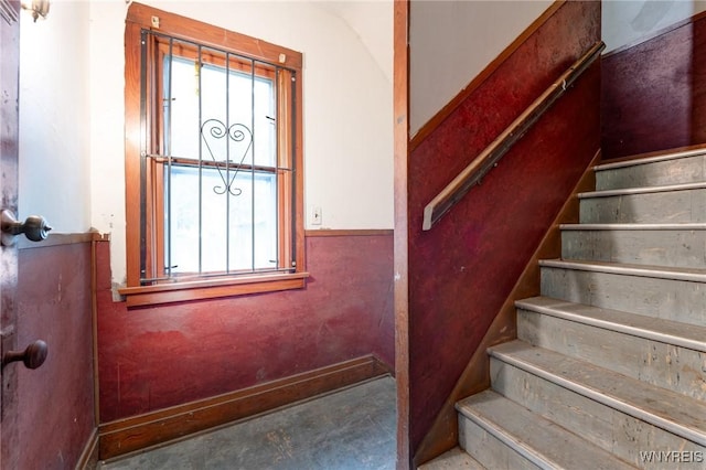 75 Schutrum St, Buffalo, NY 14212 - staircase featuring concrete floors and baseboards