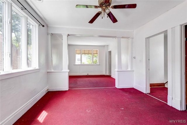 75 Schutrum St, Buffalo, NY 14212 - empty room with decorative columns, carpet, and ceiling fan