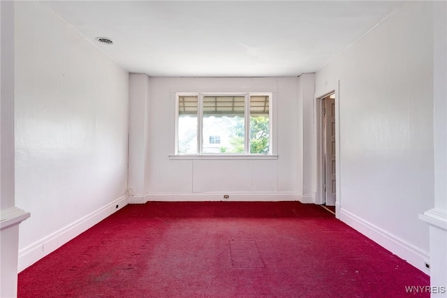 75 Schutrum St, Buffalo, NY 14212 - unfurnished room with dark colored carpet and baseboards