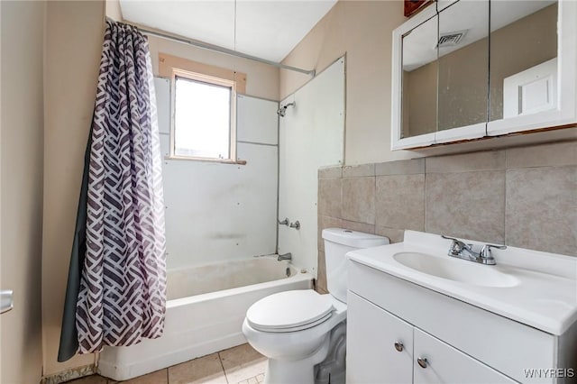75 Schutrum St, Buffalo, NY 14212 - bathroom featuring shower / bath combination with curtain, vanity, tile patterned flooring, and tile walls