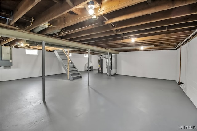 101 Kurtz Ave, Lancaster, NY 14086 - basement featuring electric panel, gas water heater, and stairway