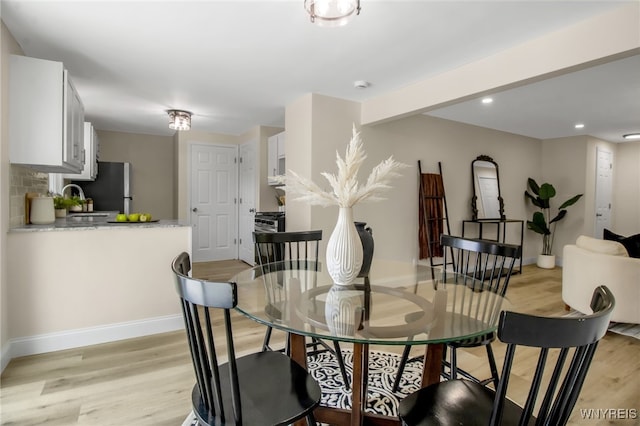 101 Kurtz Ave, Lancaster, NY 14086 - dining space featuring light wood-style flooring and recessed lighting