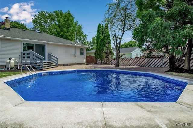 101 Kurtz Ave, Lancaster, NY 14086 - view of swimming pool with a fenced backyard and entry steps