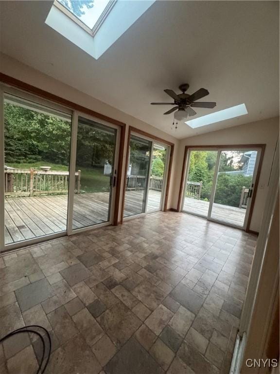 124 N Way, Camillus, NY 13031 - unfurnished sunroom with a skylight and vaulted ceiling