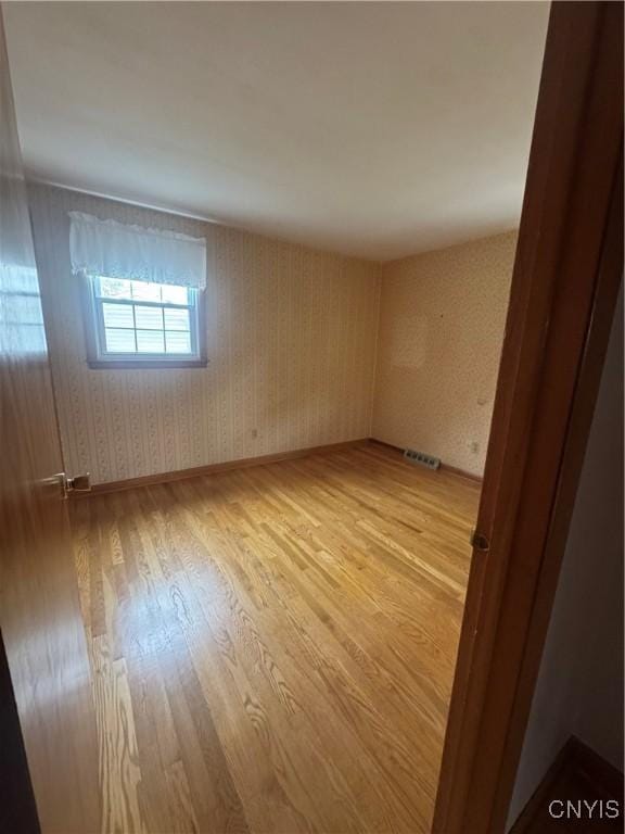 124 N Way, Camillus, NY 13031 - spare room featuring light wood-style floors