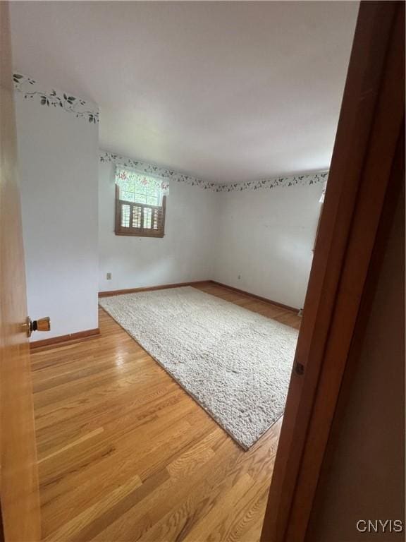 124 N Way, Camillus, NY 13031 - empty room featuring wood finished floors and baseboards