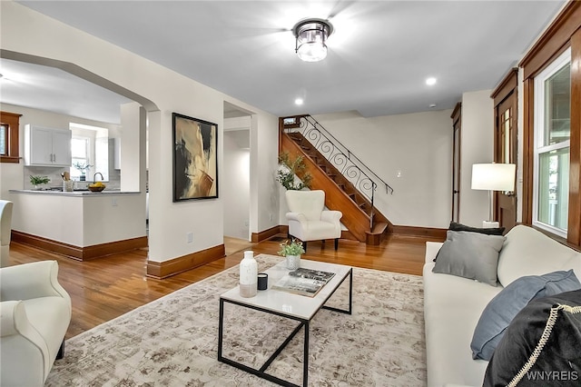 111 Montrose Ave, Buffalo, NY 14214 - living area with wood finished floors, stairway, and recessed lighting