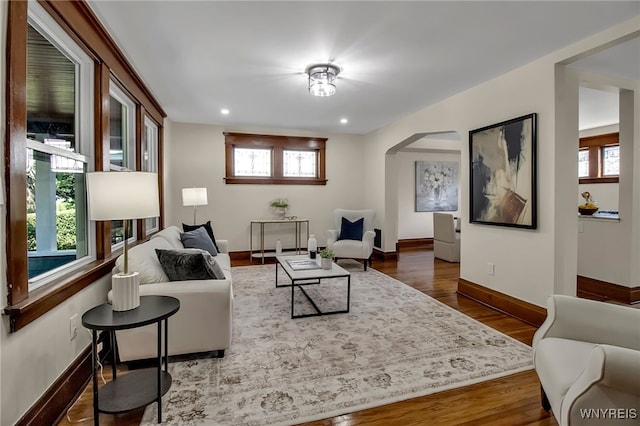 111 Montrose Ave, Buffalo, NY 14214 - living area featuring arched walkways, wood finished floors, and recessed lighting