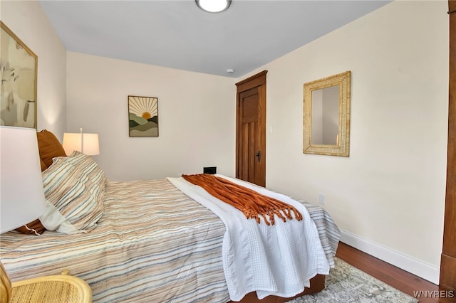 111 Montrose Ave, Buffalo, NY 14214 - bedroom featuring baseboards and wood finished floors