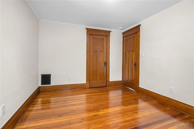 111 Montrose Ave, Buffalo, NY 14214 - spare room featuring light wood-style floors and ornamental molding