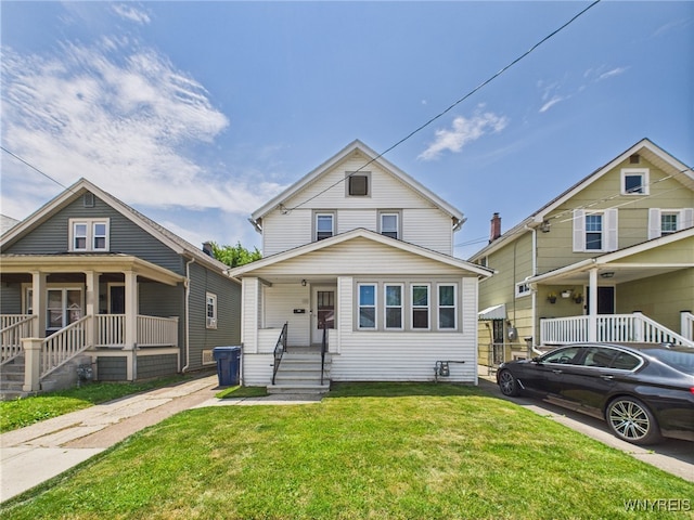 125 Phyllis Ave, Buffalo, NY 14215 - view of front of home featuring covered porch and a front lawn