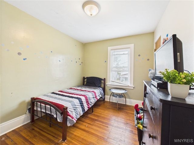 125 Phyllis Ave, Buffalo, NY 14215 - bedroom featuring baseboards and wood-type flooring