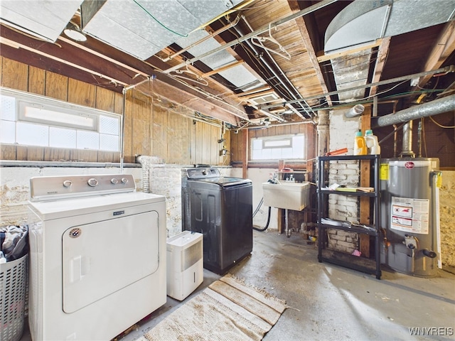 125 Phyllis Ave, Buffalo, NY 14215 - laundry room with washing machine and clothes dryer and gas water heater