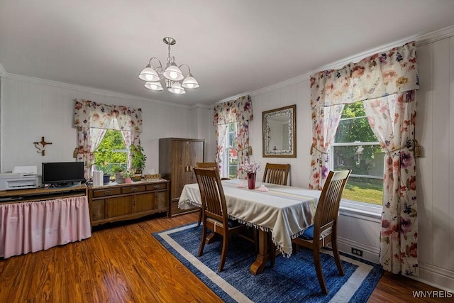 19 Reed St, Lockport City, NY 14094 - dining room with crown molding, a chandelier, plenty of natural light, and wood finished floors